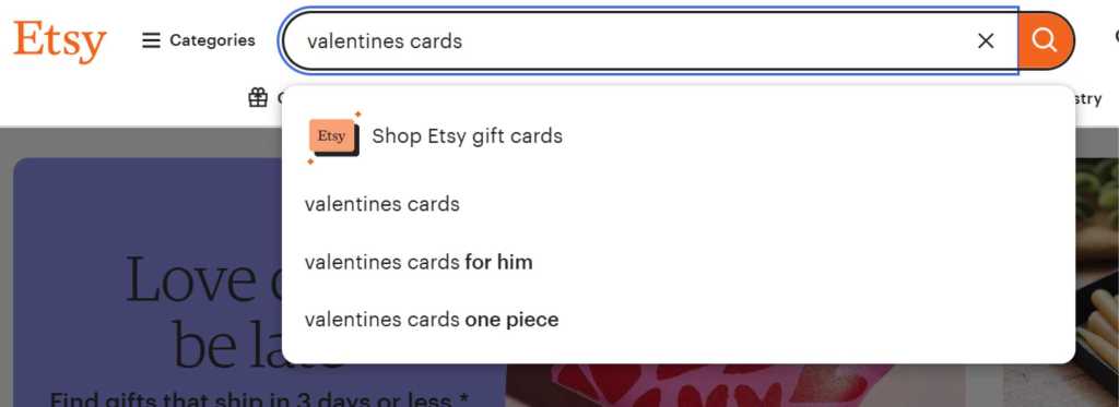 A screenshot of the Etsy search bar with the search term 'valentines cards' and relevant search suggestions